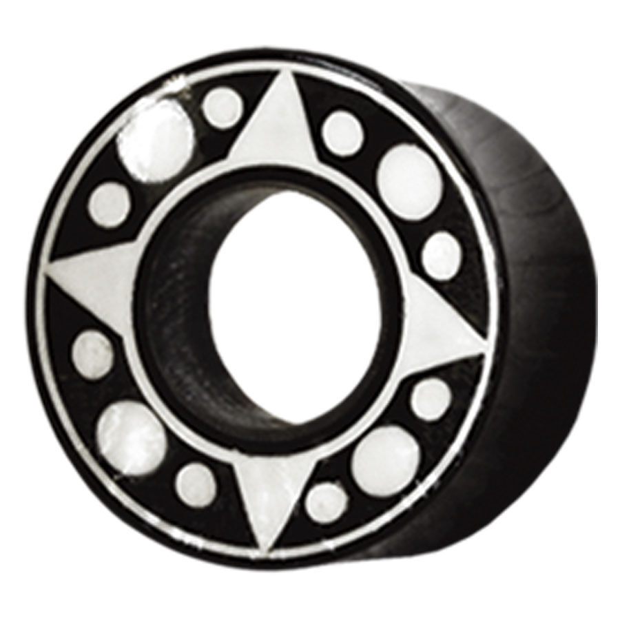 Schwarzer Tunnel aus Horn mit weißen Sternen und Punkten