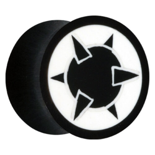 Runder schwarzer Horn Plug mit weißem Sternmotiv auf schwarzem Hintergrund